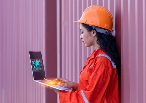 material handling solutions of the future woman working laptop